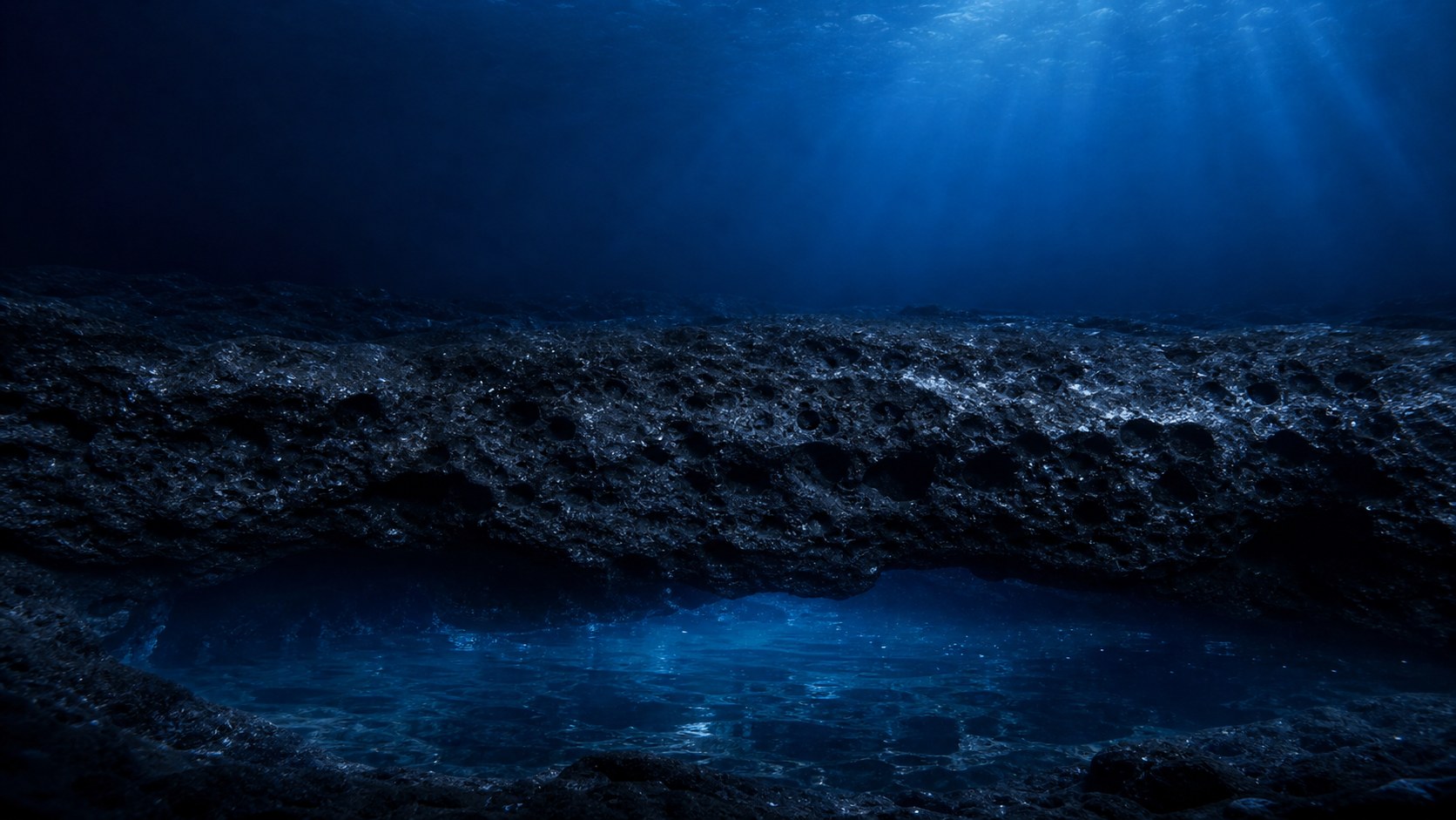 An illustration of seawater passing through volcanic rock layers and collecting underground